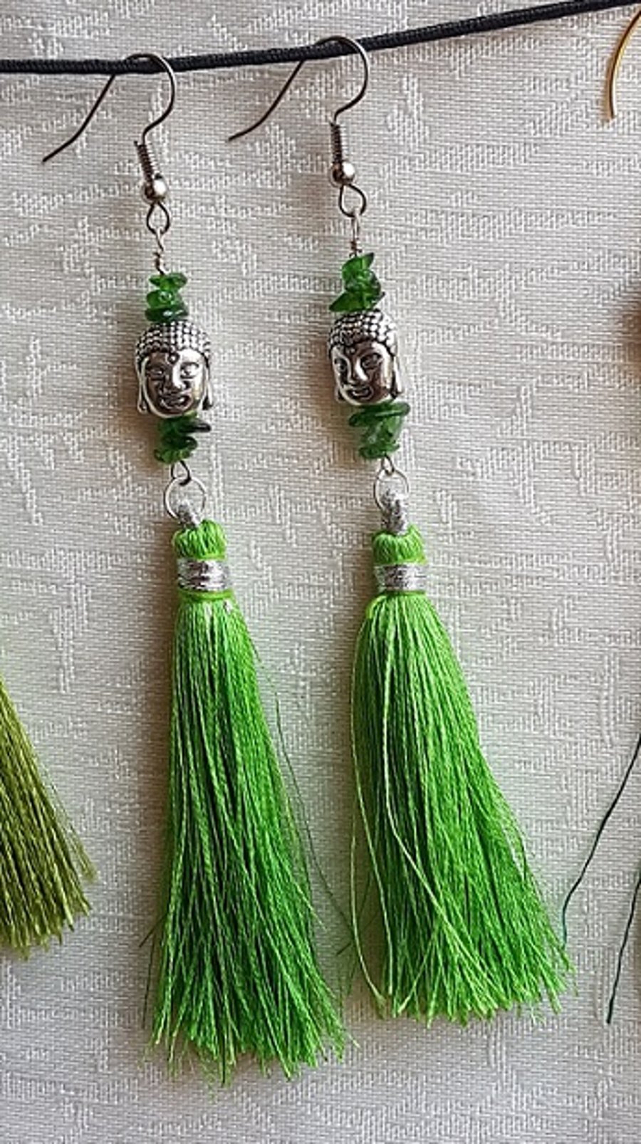 Green Buddha Tassel Earrings