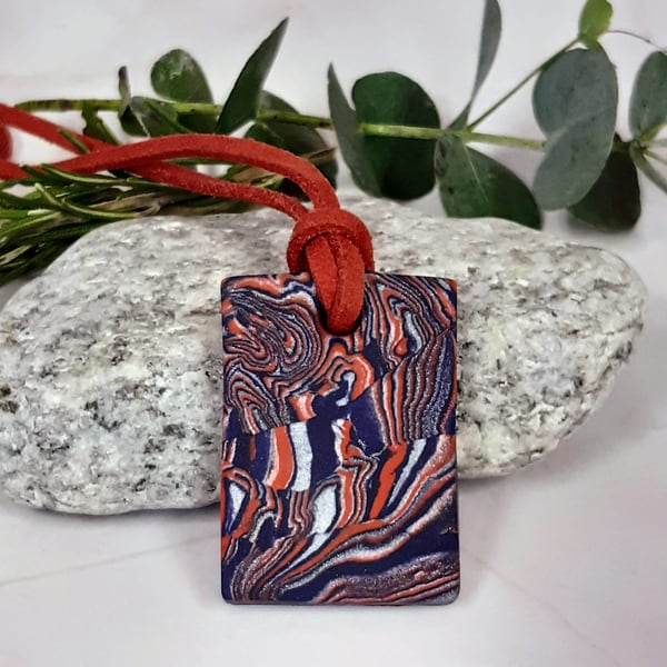 Red, blue and silver rectangular pendant