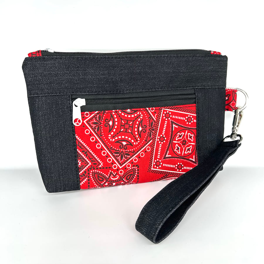 Black denim and red paisley wristlet zipper pouch. red print accent pocket. 