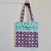 Tote bag in purple and green fabric