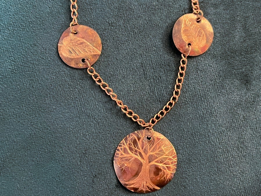 Hand-engraved burnished copper necklace with tree & leaves motive