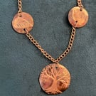 Hand-engraved burnished copper necklace with tree & leaves motive