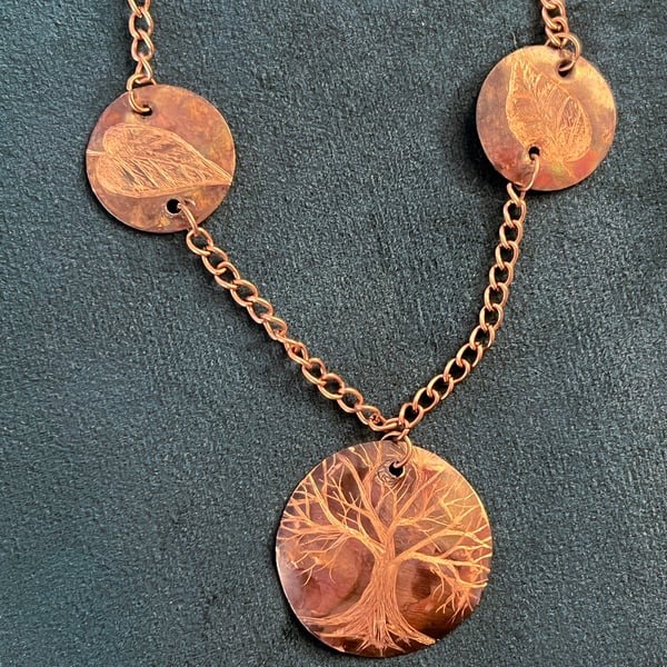 Hand-engraved burnished copper necklace with tree & leaves motive