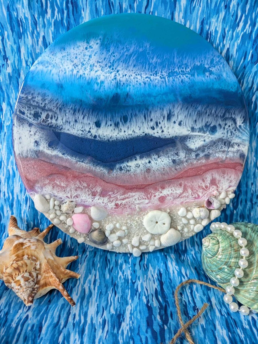 Beach with blue and pink sea