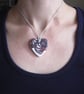 Filigree Artwork Design on Heart Shaped Ceramic Pendant on Grey Cord - Image 3