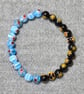 Pale Blue and Black-Amber Millefiori Bead Elastic Half and Half Bracelet - Image 4