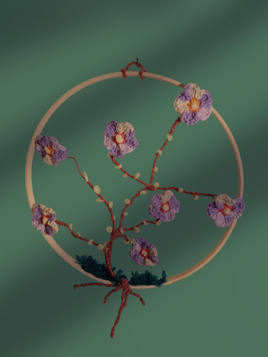 crochet flowers in bamboo hoop