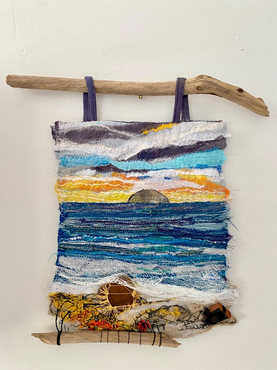 Sunset over the sea a textile seascape hanging