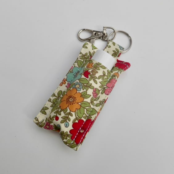 Key ring lip balm holder in colourful floral fabric keyring 