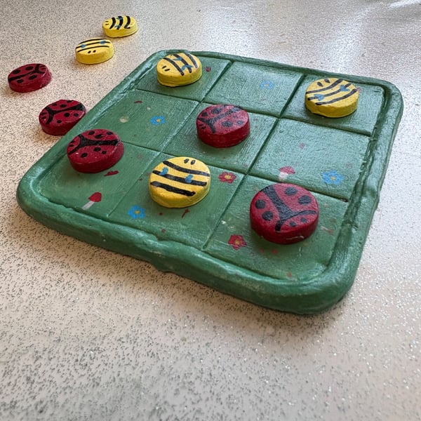 Handmade clay tik tak toe board and pieces bee and ladybug themed game