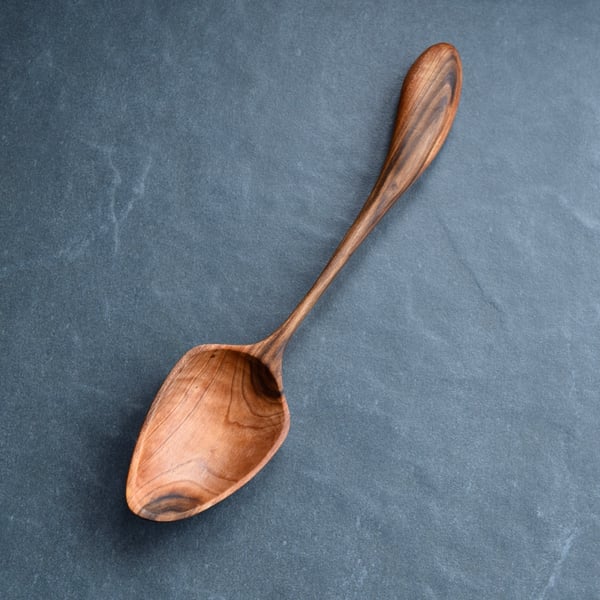 Hand carved wooden serving spoon, carved from greengage wood