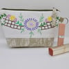 Make up bag in green fabric with vintage embroidery