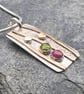 Silver and Gold Shoreline Necklace with Ruby and Peridot 