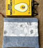 Reclaimed denim and floral book pouch zip bag clutch with reclaimed materials - Image 1