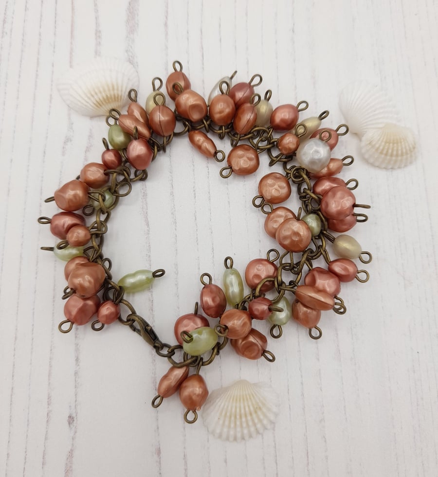 Copper and green faux pearl chain bracelet