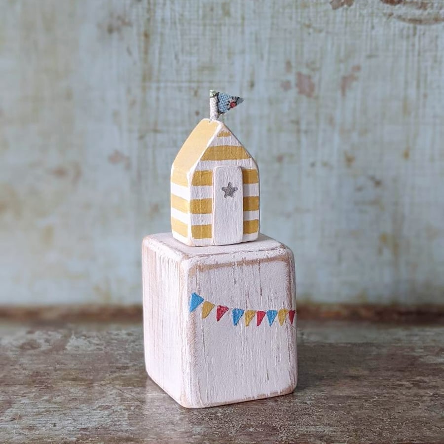 Tiny Yellow Stripe Beach Hut on Wooden Block with Bunting