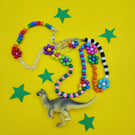 Chunky beaded necklace with up-cycled dinosaur charm