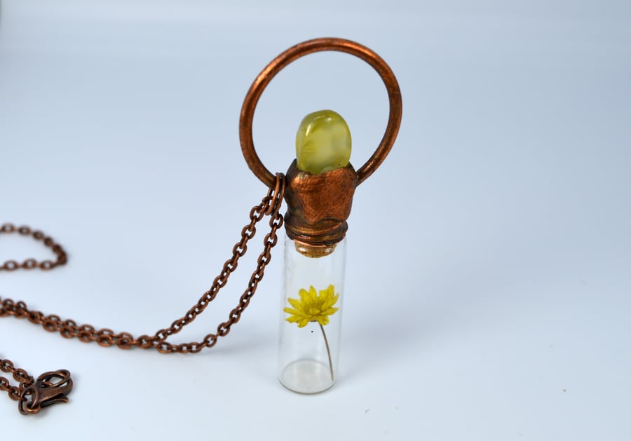 Flower in a jar with yellow agate