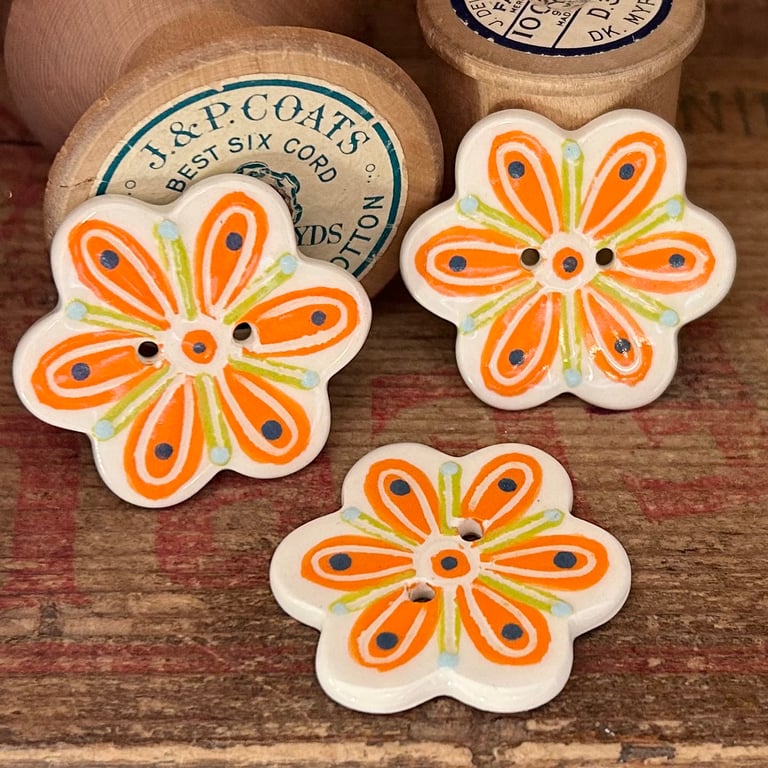 Set of three Ceramic buttons with handpainted flower design