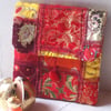 Asia - small textile art fabric clutch bag in orange, red and yellow