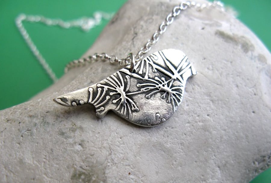 Fine silver bird necklace with dandelion seeds
