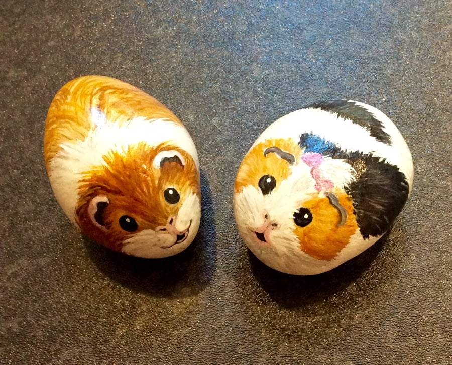 Two Guinea pigs painted pebble rock pets 