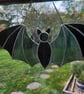 Stained glass halloween flying bat