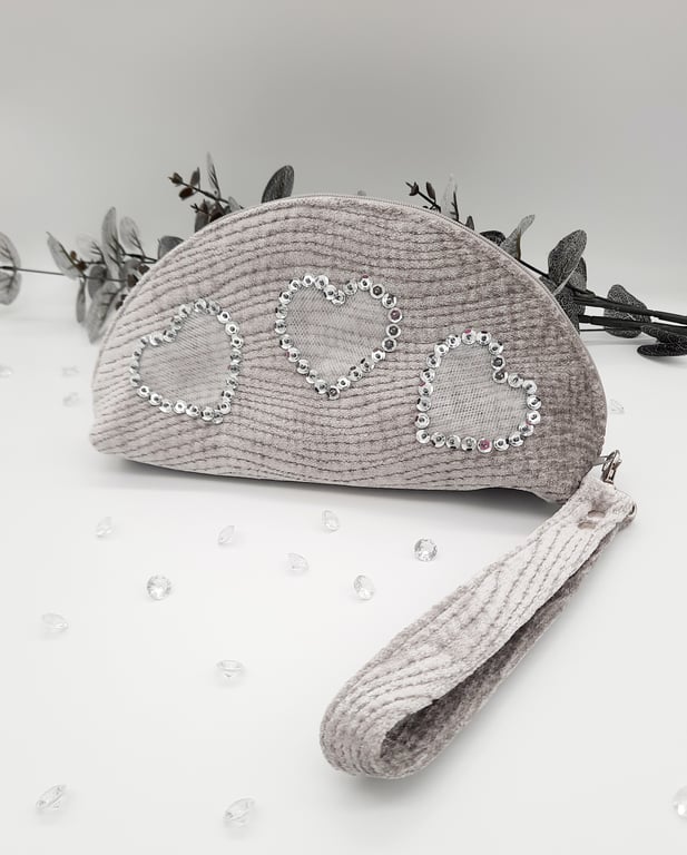 Silver chenille clutch bag with hearts and wristlet.  