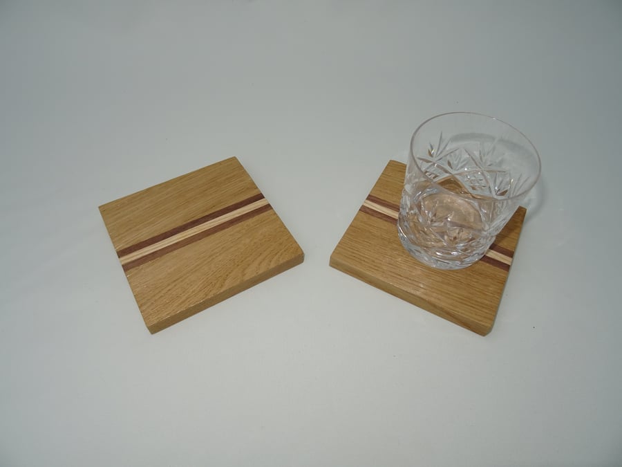 Pair of drinks coasters in Oak with Ash and Black Walnut stripes