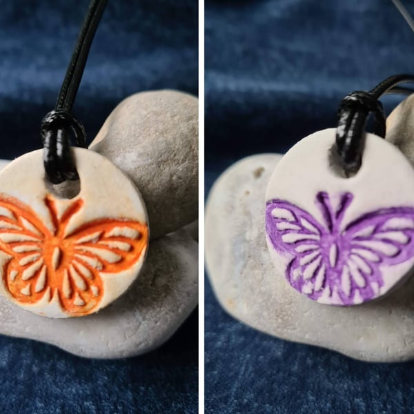 Clay small round embossed butterfly orange or purple lilac necklace pendant