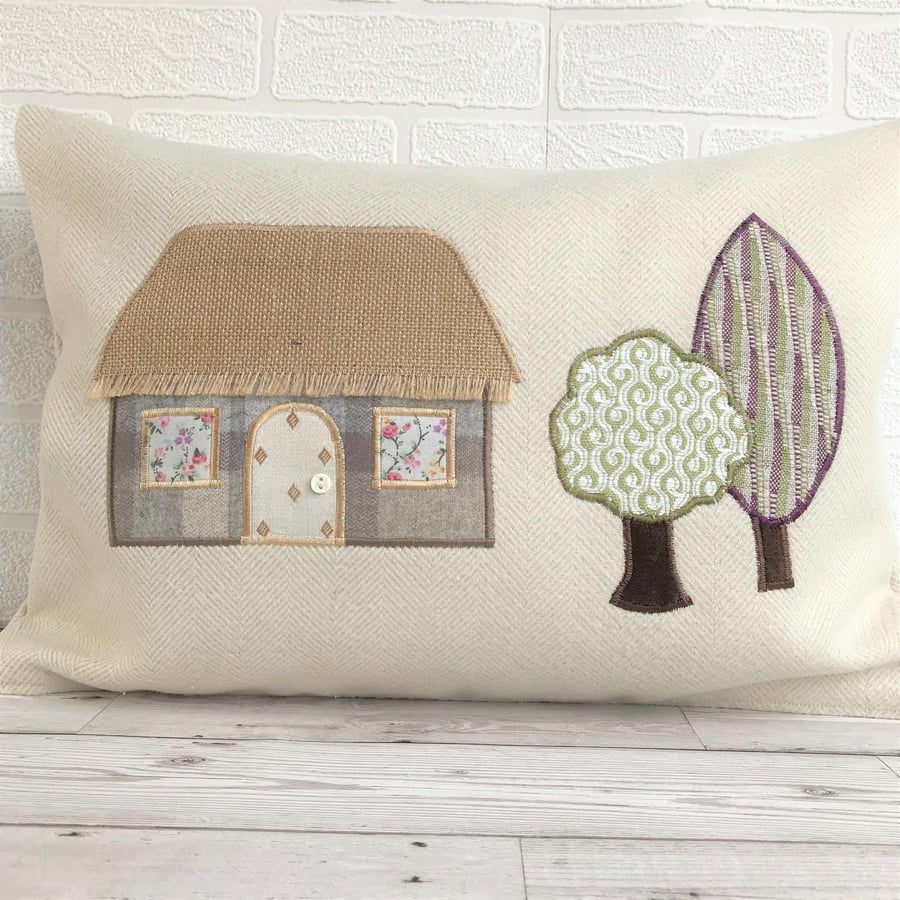 Rustic thatched cottage and trees cushion, rectangular cushion