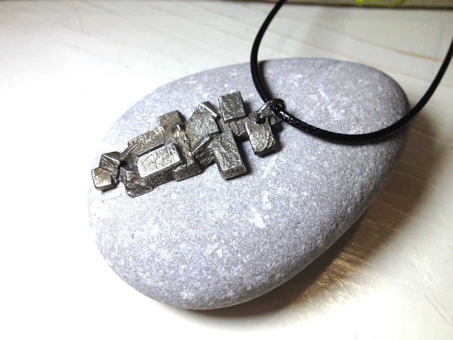  Pewter Pendant on Cord. 