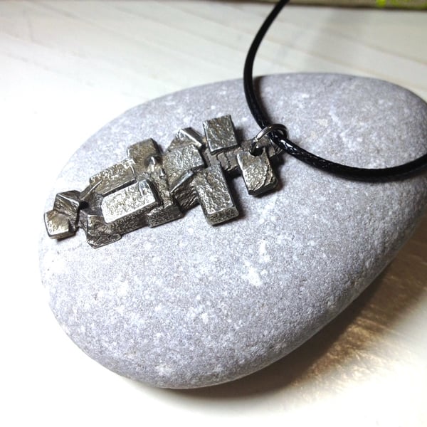  Pewter Pendant on Cord. 