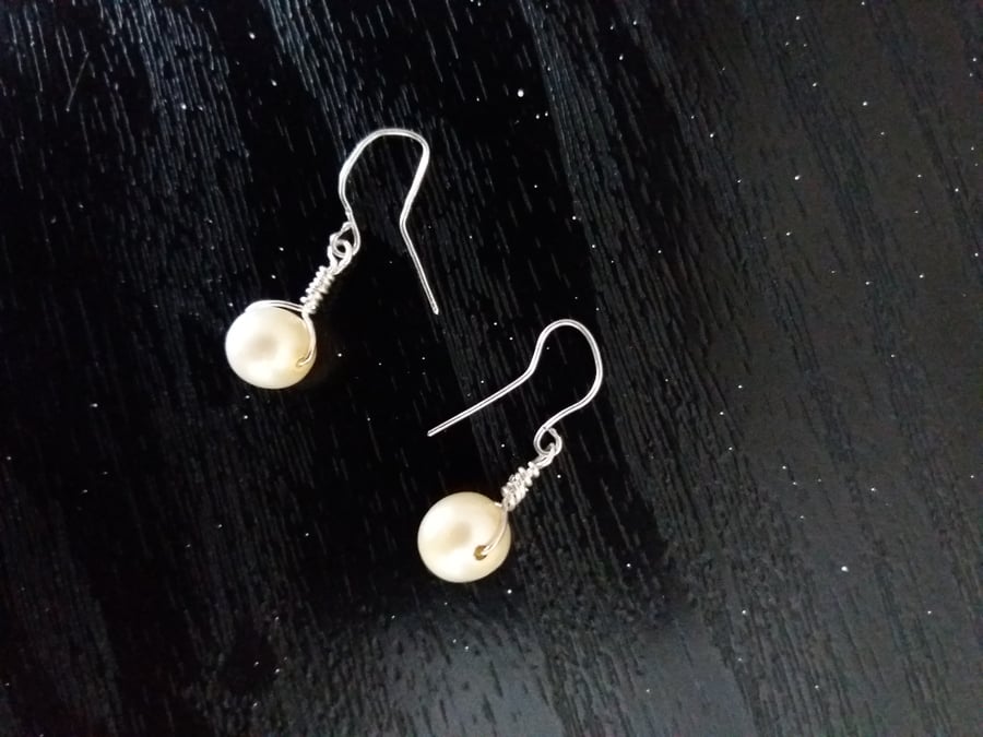 Pearl and fine silver earrings