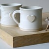 Set of two heart mugs glazed in vanilla cream - hand thrown stoneware pottery