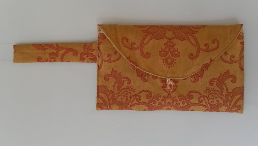 Clutch Bag with Wrist Strap, Gold with Red Design 