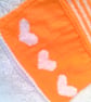 Hand Knitted Tangerine Dress with White Heart Decoration, Baby Girl's Dress - Image 3