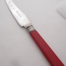 Lay it on thick, vintage spreader, red handle, handstamped