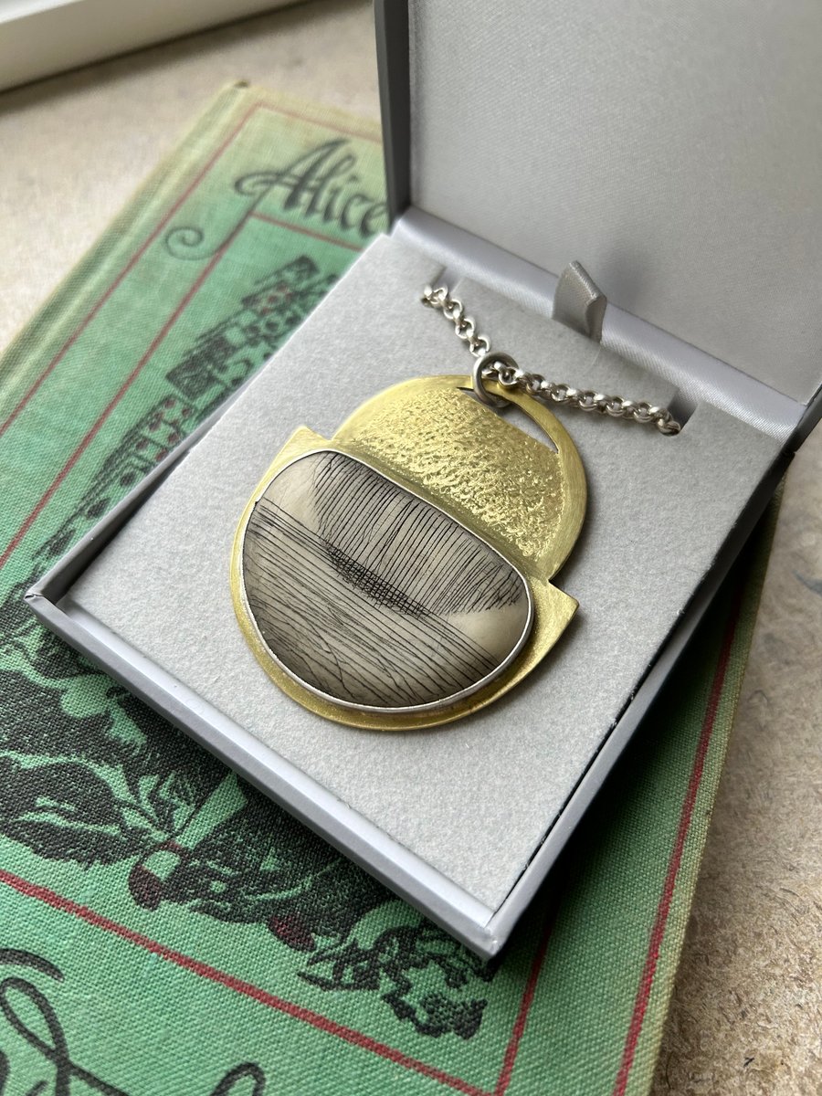 ‘Setting Sun’ Brass and Sterling Silver pendant necklace on an 18” belcher chain