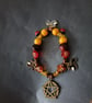 Elasticated nature-inspired beaded charm bracelet with pentacle - Image 2
