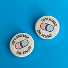 Cure ignorance and ableism not autism badge, pocket pebble, magnet or keyring.