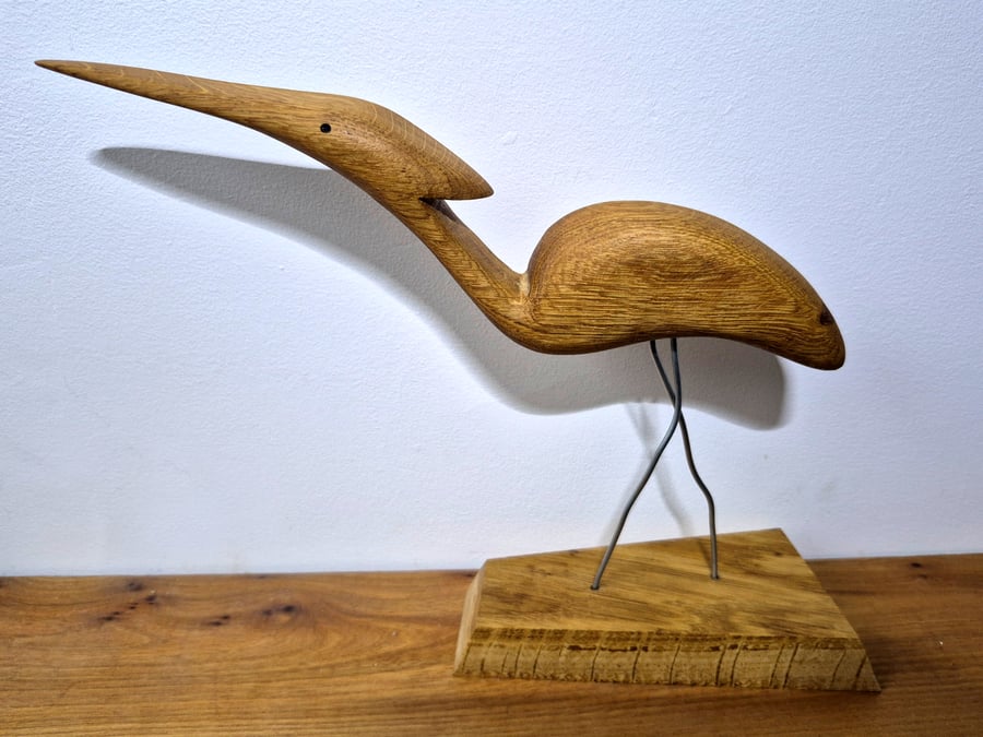 Solid oak heron bird