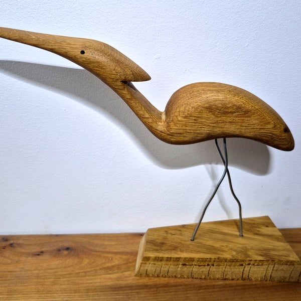 Solid oak heron bird