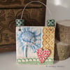 Small decorative ceramic tile with handmade beads patchwork design