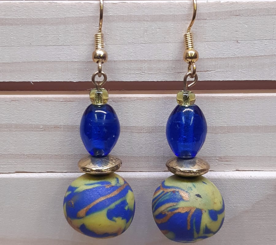 Blue and yellow dangly earrings