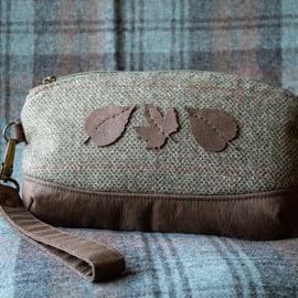 Country green tweed and faux leather leaf design clutch bag