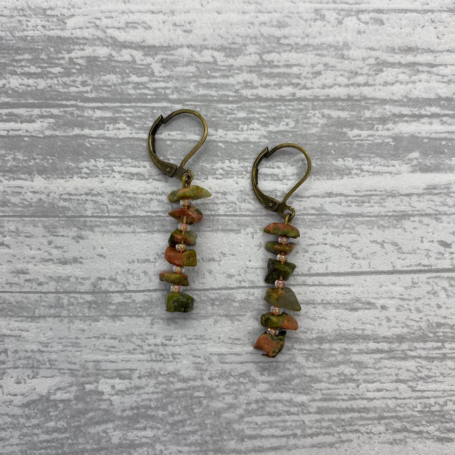 Drop earrings with chipped unakite on bronze tone leverbacks 