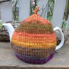  Tea cosy - hand knitted in a sunset colours wool blend chunky yarn 
