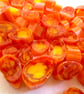 50g Streaky Orange petal murrini made with Bullseye 90coe glass