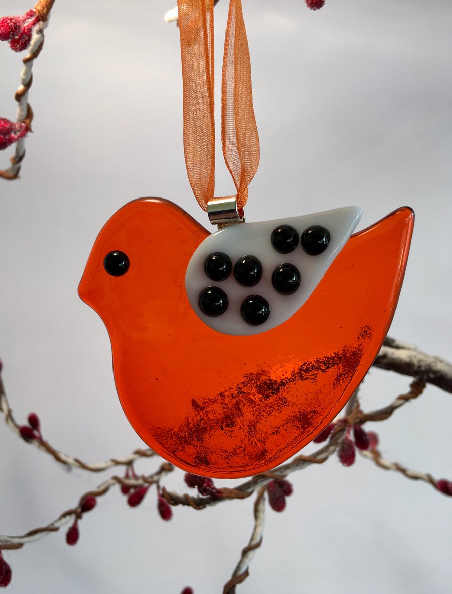 Image of Orange Fused Glass Bird with Spotted Wing